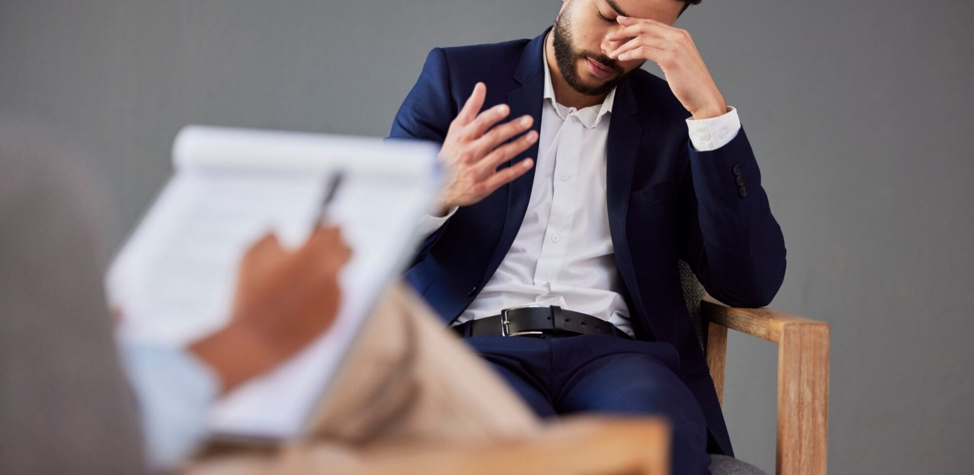 sad man consulting therapist in therapy or counsel 39hmnfy