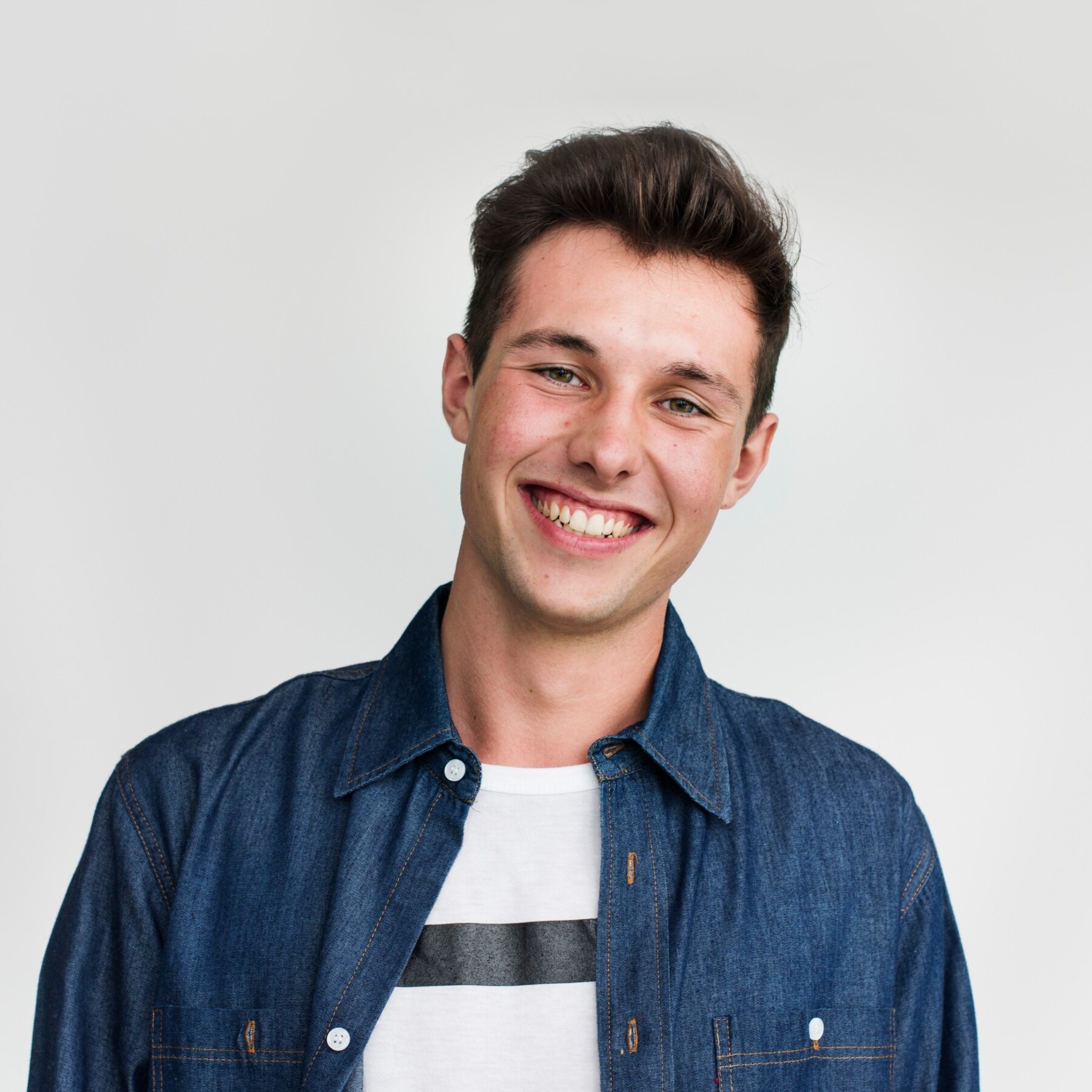 young man smiling happy concept p9bb3gm 1.jpg